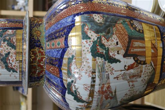 A large Japanese Imari fluted vase and cover, late 19th century, 79cm, broken and repaired